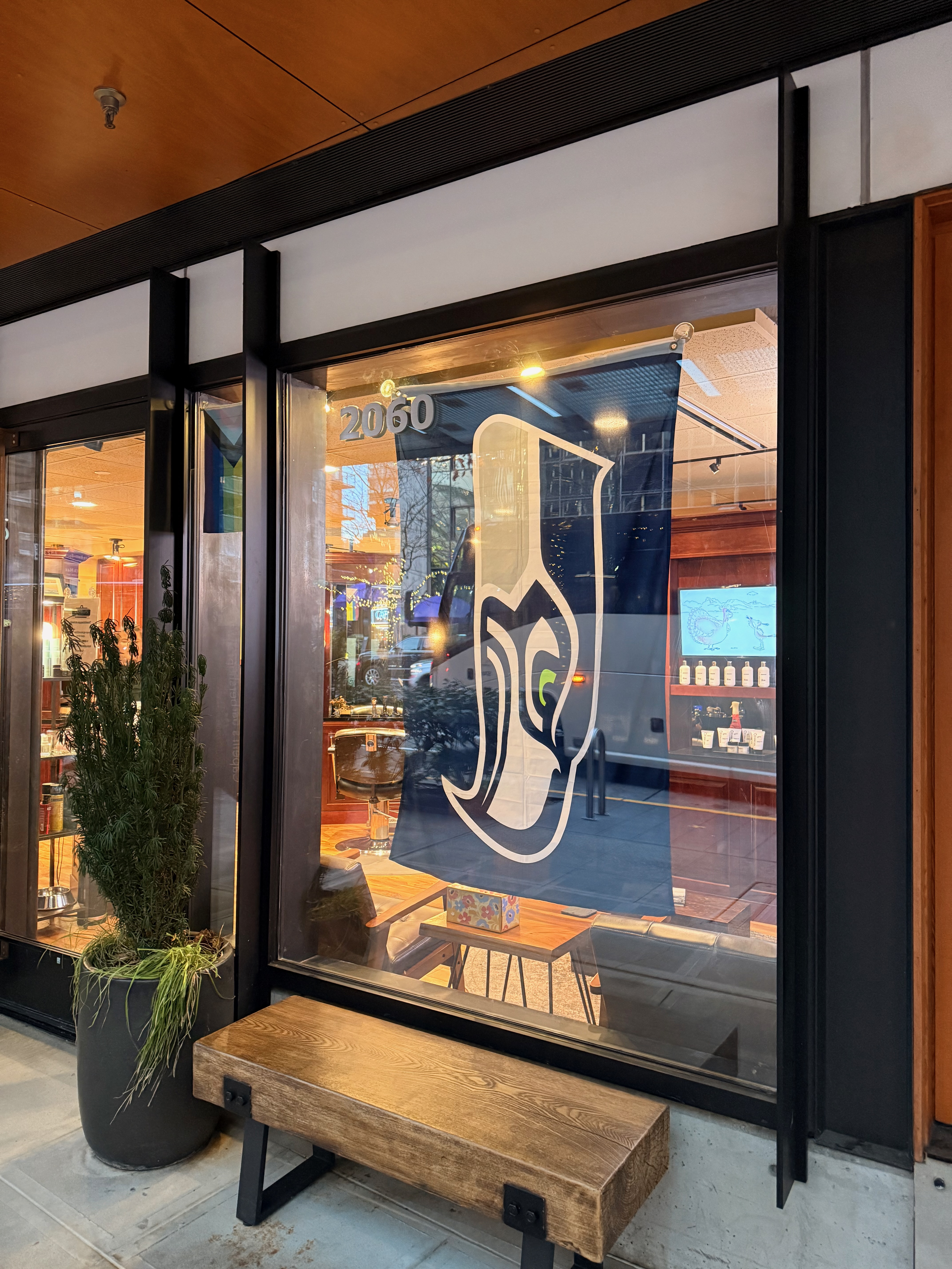 Seahawks logo banner displayed in a shop window